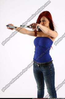 2013 06 NINA DUAL GUNS POSE2 07