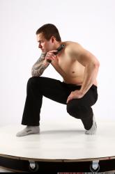 Man Adult Athletic White Fighting with gun Kneeling poses Pants