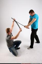 Adult Average White Fighting with sword Fight Casual Men