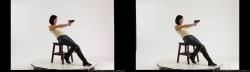 3d-stereoscopic-natalie-sitting-leaning-back-shooting-pistol