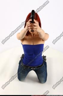 2013 09 NINA KNEELING AIMING PISTOL 00