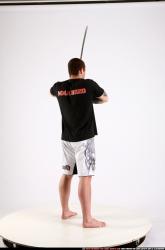 Man Adult Athletic White Fighting with sword Standing poses Sportswear