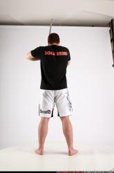 Man Adult Athletic White Fighting with sword Standing poses Sportswear