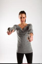 Woman Adult Athletic White Fighting with gun Standing poses Casual