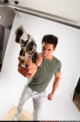 lukas-standing-shooting-revolver