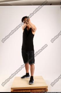 2014 06 JERALD MOB STANDING AIMING PISTOL 00 C