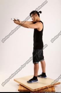 2014 06 JERALD MOB STANDING AIMING PISTOL 01 B