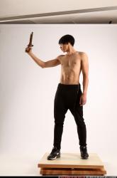 Man Young Athletic Fighting with rifle Standing poses Pants Asian