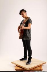 Jerald-playing-guitar