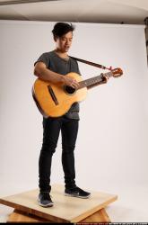 Jerald-playing-guitar