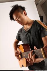 Jerald-playing-guitar