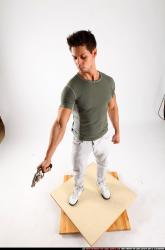 Man Adult Athletic White Fighting with gun Standing poses Casual