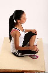Woman Young Athletic Fitness poses Sitting poses Sportswear Latino