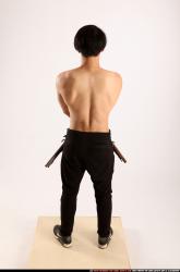 Man Young Athletic Fighting with gun Standing poses Pants Asian