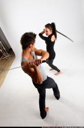 Man & Woman Adult Athletic White Fighting with sword Standing poses Casual