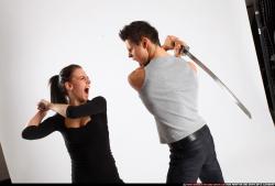 Man & Woman Adult Athletic White Fighting with sword Standing poses Casual