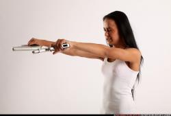 Woman Young Athletic Fighting with gun Standing poses Casual Latino