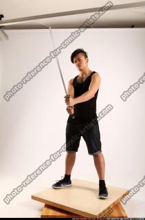 2014 12 JERALD MOB HOLDING KATANA DEFAULT POSE 01 C