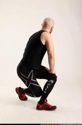 Man Adult Athletic White Fitness poses Standing poses Sportswear