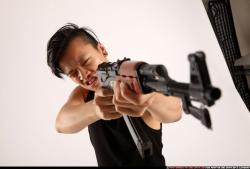 Jerald-mob-aiming-shooting-ak