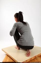 Woman Young Athletic White Neutral Kneeling poses Casual