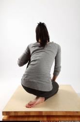 Woman Young Athletic White Neutral Kneeling poses Casual