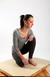 Woman Young Athletic White Neutral Kneeling poses Casual