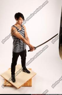 2015 04 KEIJI HOLDING KATANA DEFAULT POSE 07 A