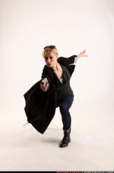 Woman Adult Athletic White Fighting with gun Kneeling poses Coat