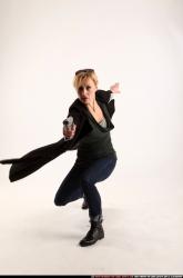 Woman Adult Athletic White Fighting with gun Kneeling poses Coat