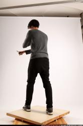 Man Young Athletic Fighting with knife Standing poses Casual Asian