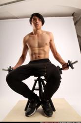 Man Young Athletic White Fitness poses Sitting poses Pants