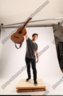 2015 06 JERALD LIFTING GUITAR 00 C