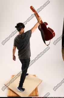 2015 06 JERALD LIFTING GUITAR 05 A