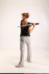 Woman Adult Athletic White Fighting with sword Standing poses Casual