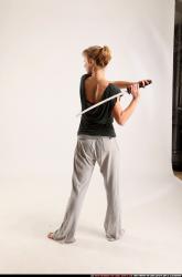 Woman Adult Athletic White Fighting with sword Standing poses Casual