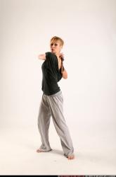 Woman Adult Athletic White Fighting with sword Standing poses Casual