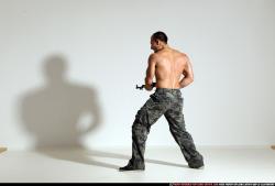 Man Adult Athletic White Fighting with submachine gun Moving poses Pants