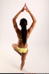 Woman Young Athletic Fitness poses Standing poses Sportswear Latino