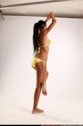 Woman Young Athletic Fitness poses Standing poses Sportswear Latino