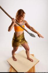 amy-prehistoric-standing-spear-attack