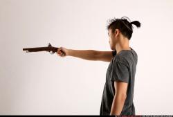 Man Young Athletic Fighting with gun Standing poses Casual Asian