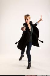 Woman Adult Athletic White Fighting with gun Standing poses Coat