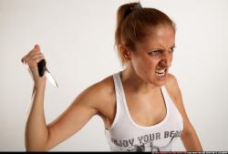 Woman Adult Athletic White Fighting with knife Standing poses Casual