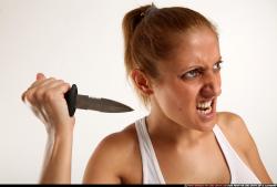 Woman Adult Athletic White Fighting with knife Standing poses Casual