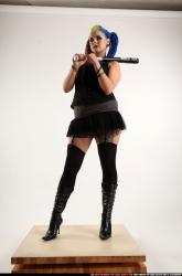 Woman Young Average White Standing poses Casual Fighting with bat