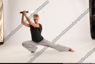 rachel-kneeling-sword-pose