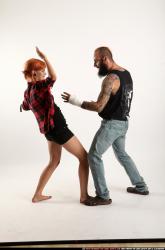 Man & Woman Adult Athletic White Fighting with knife Standing poses Casual