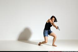 Woman Young Athletic White Fighting with gun Moving poses Casual