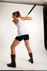 Woman Adult Athletic White Standing poses Casual Fighting with bat